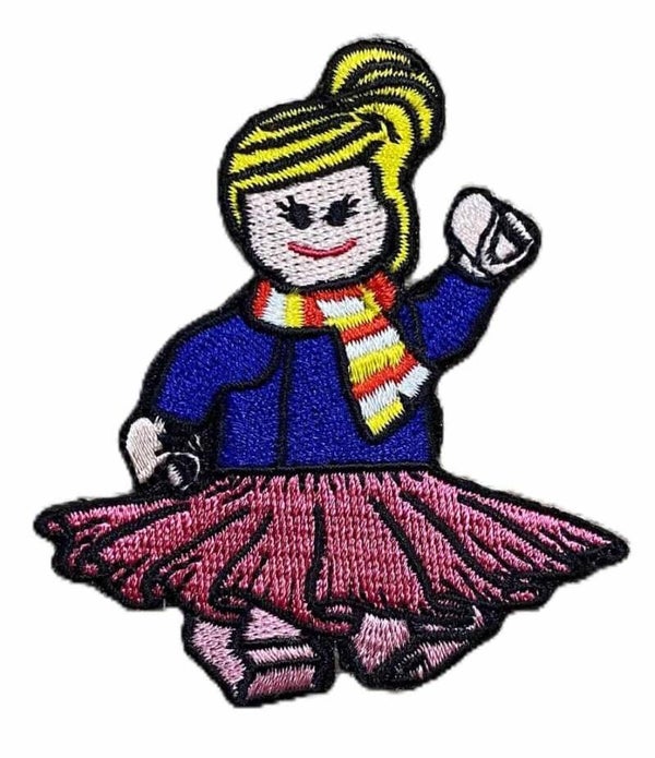 Embleem: Lego Pupke – Vrouwke