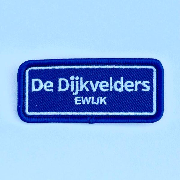 Embleem: De Dijkvelders – Ewijk 7 x 3 cm
