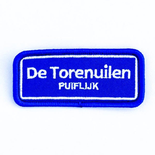 Embleem: De Torenuilen – Puiflijk 7 x 3 cm