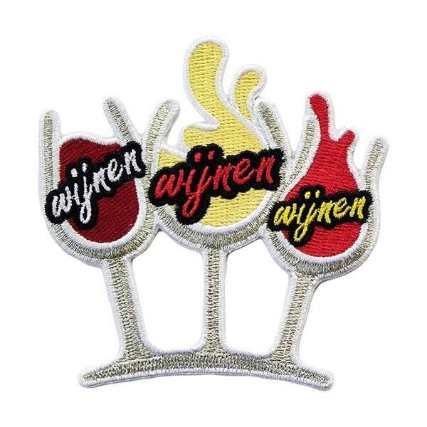 Embleem: Engeltje en duiveltje in de wolken.