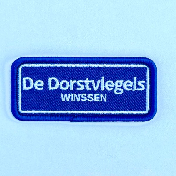 Embleem: De Dorstvlegels – Winssen 7 x 3 cm