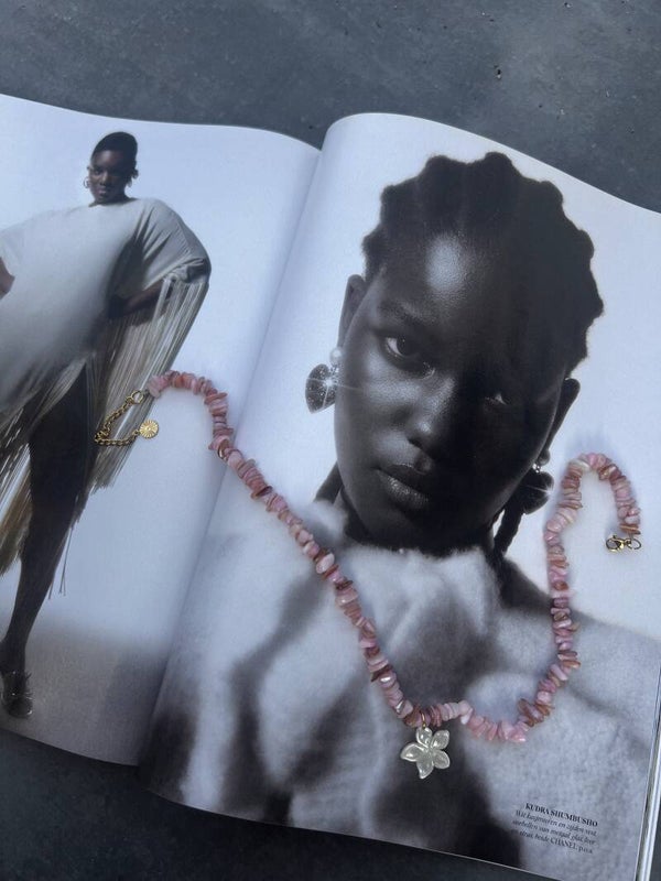 Bali ketting lichtroze met bloem