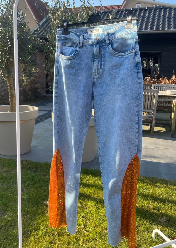 Jeans met oranje pailletten