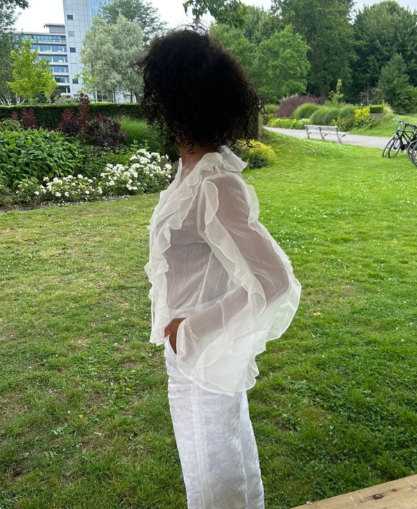 Doorschijnende blouse wit