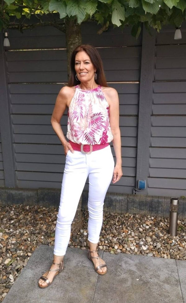 Haltertop travelstof met blad print fuchsia