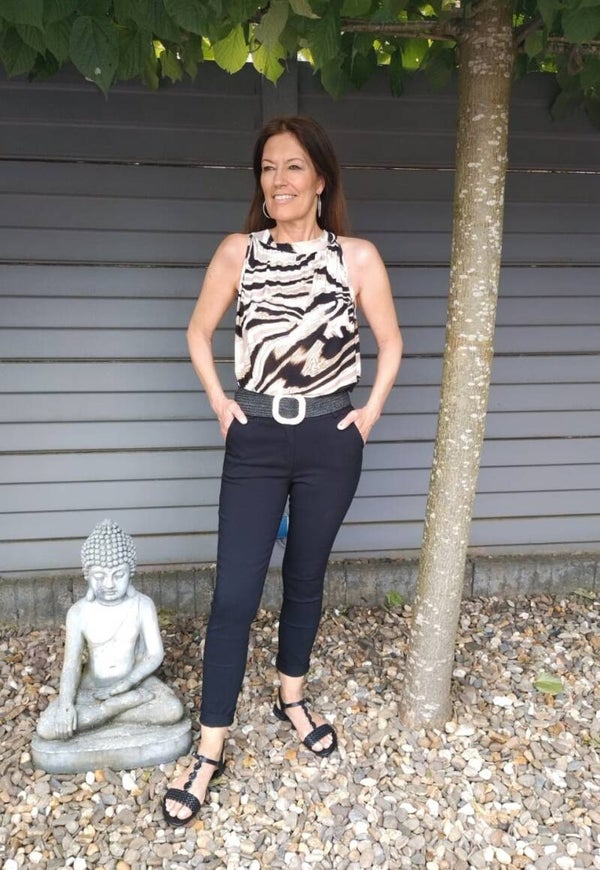 Haltertop travelstof met zebraprint zwart/beige