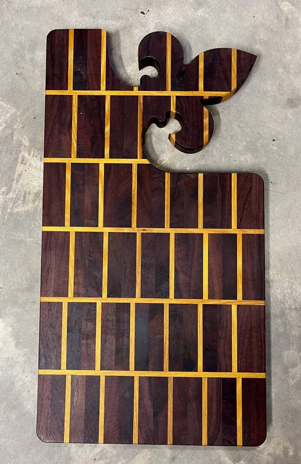 Fleur-de-lis handle cutting board