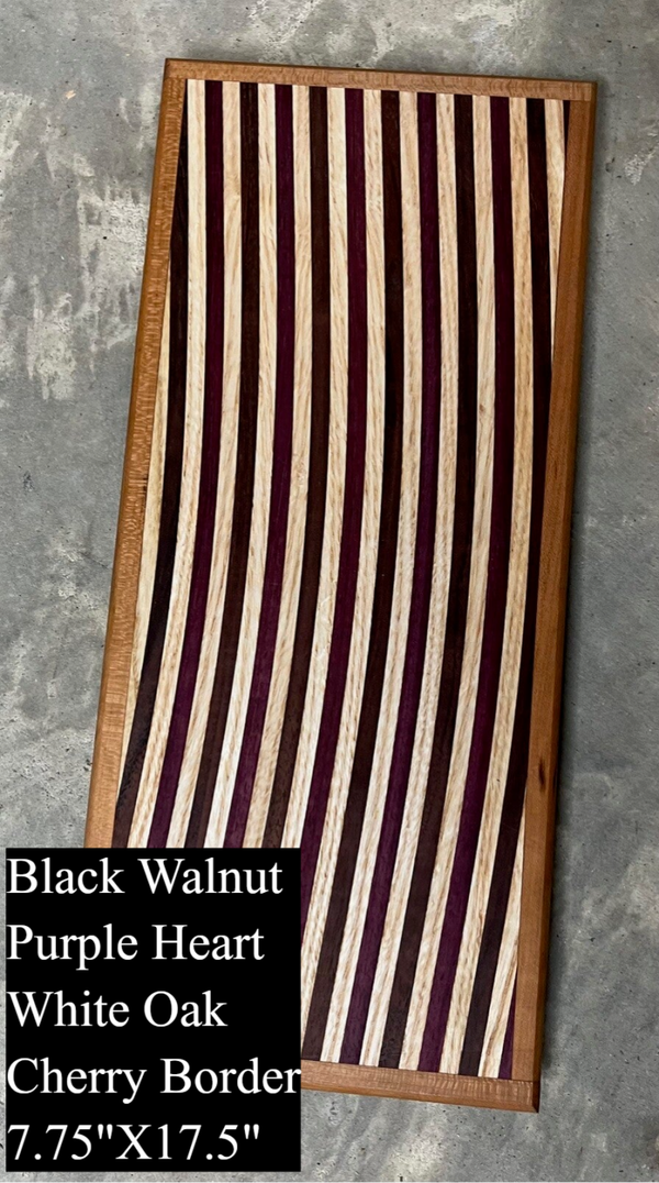 Cutting board with curved wood design
