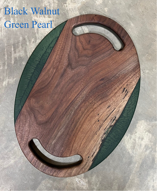 Oval charcuterie tray with handles and colored resin