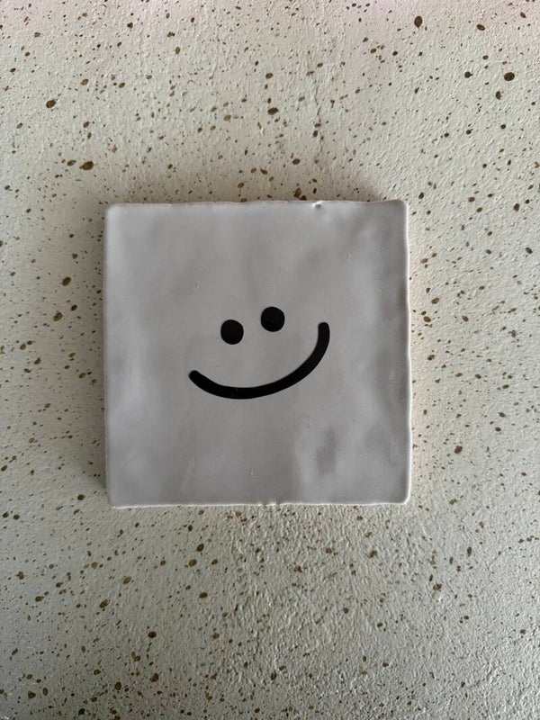 Tegeltje smiley beige