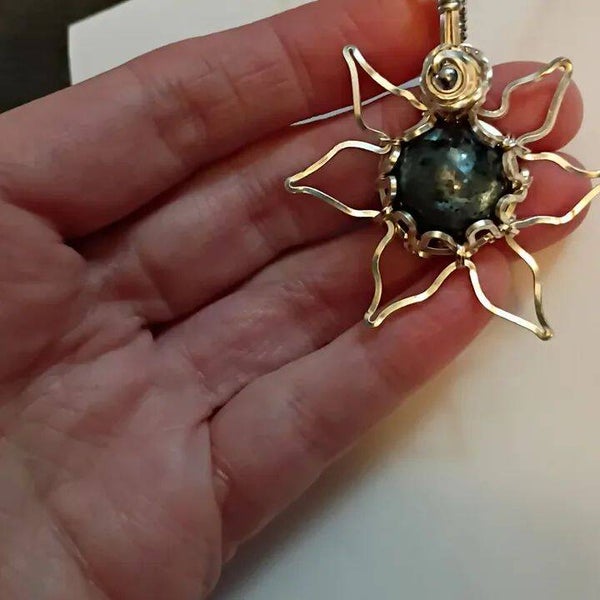 A-252 Larvakite fidget flower pendant