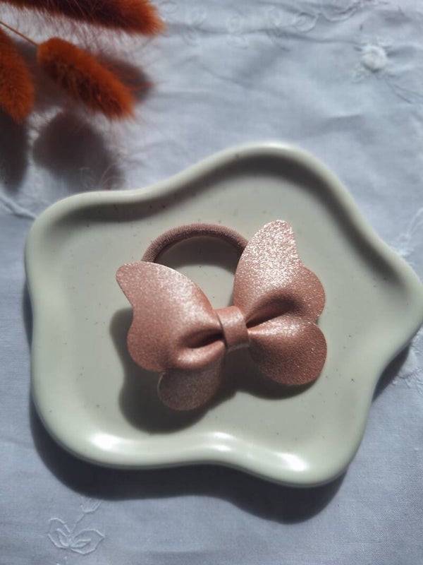 Elastiek roze vlinder