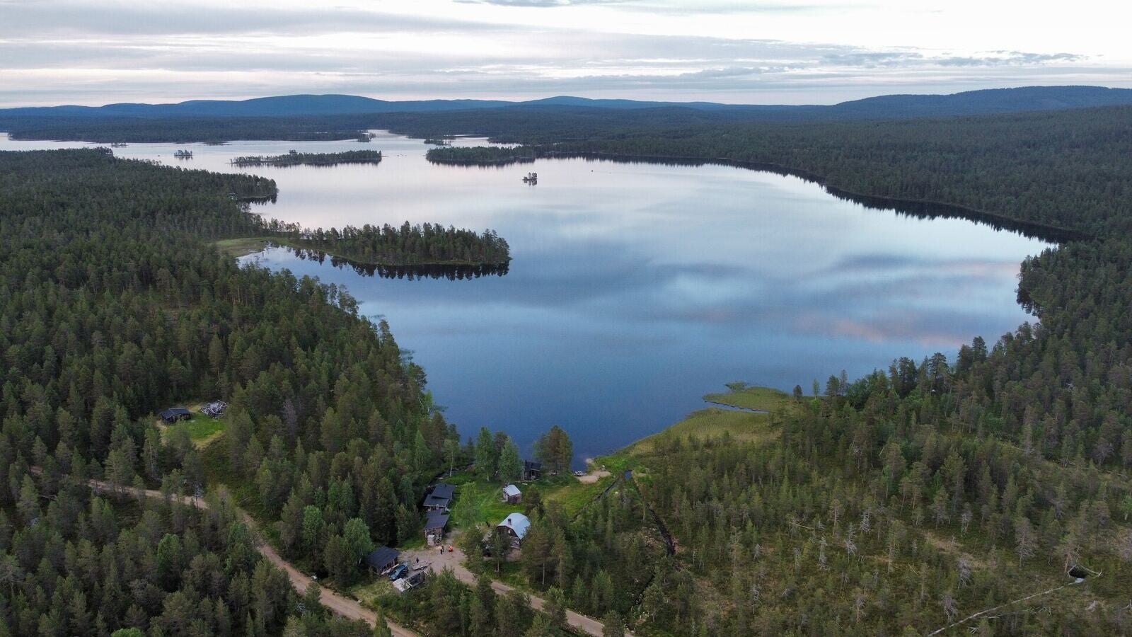 Aerial view of White Creek Wilderness cabins on the lake near Ivalo, Lapland