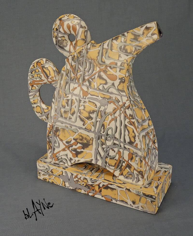 Mono print type slip decoration.