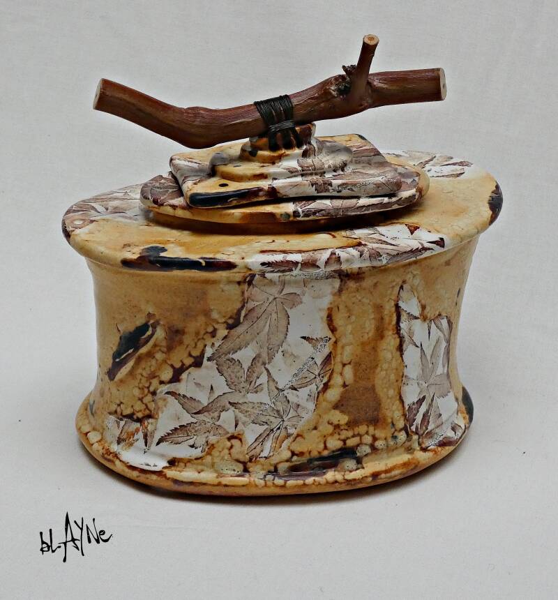 Laser decals mixed with glaze effects.