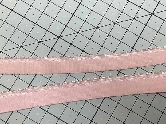 Plush scolloped edge soft pink elastic