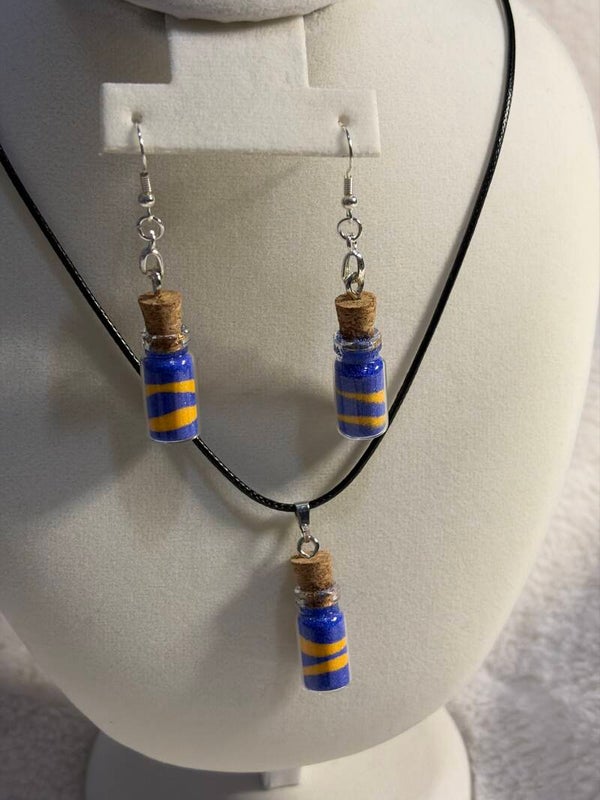 Dark blue and gold earring and necklace