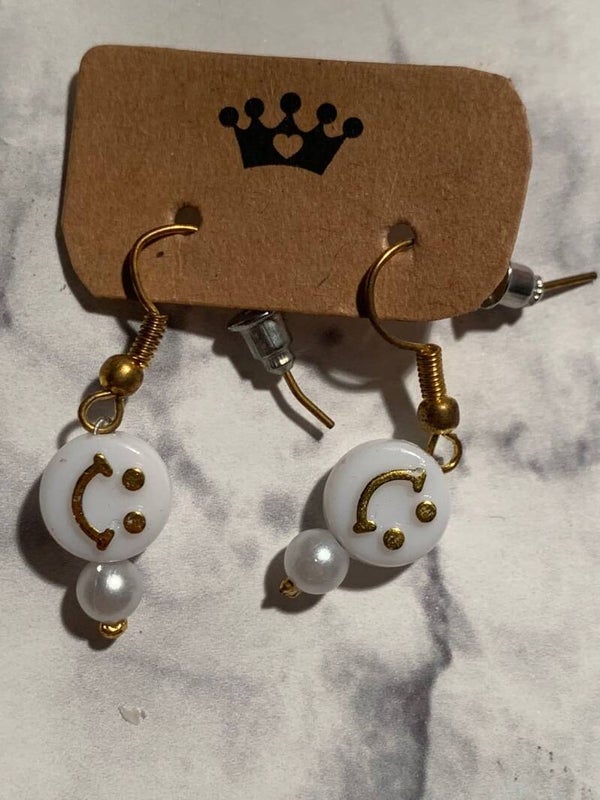 Smiley oorbellen goud