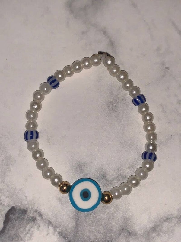 Evil eye gestreepte parel armband