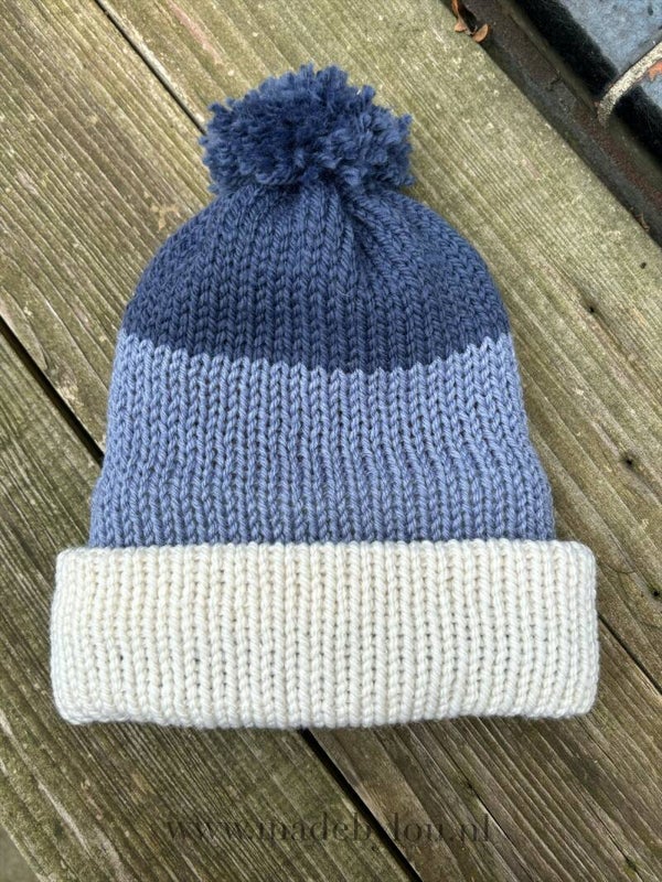 Warme winter muts met pompom