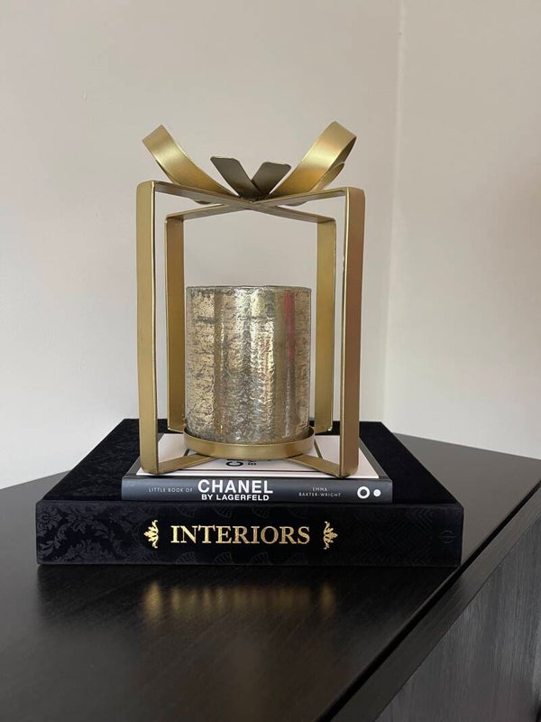 The BOW candle holder broze