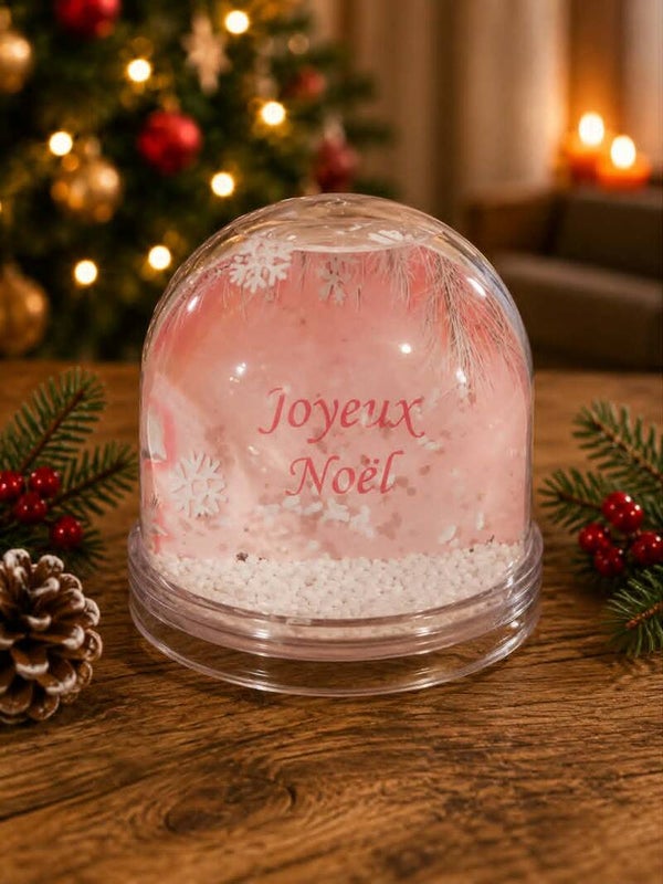 Boule à neige personnalisée - Modèle fond rose avec petit flocon et sapin