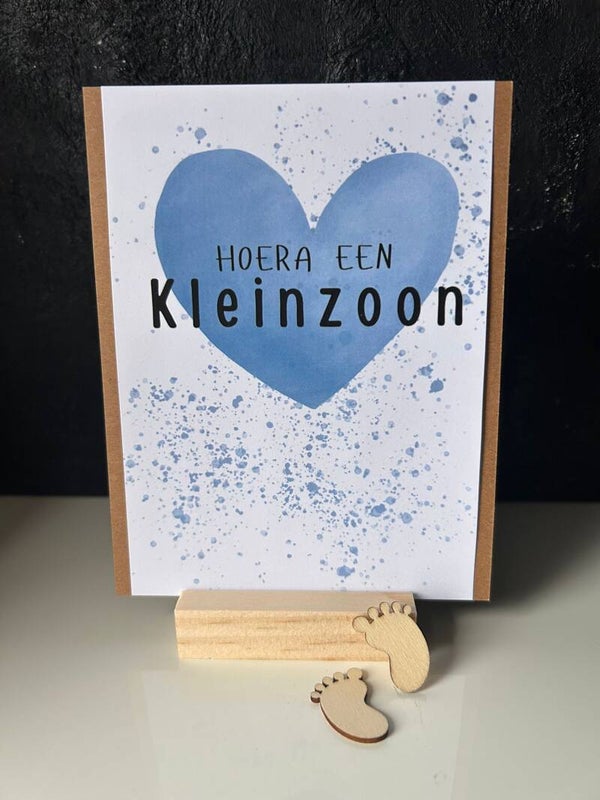 • Hoera een kleinzoon •