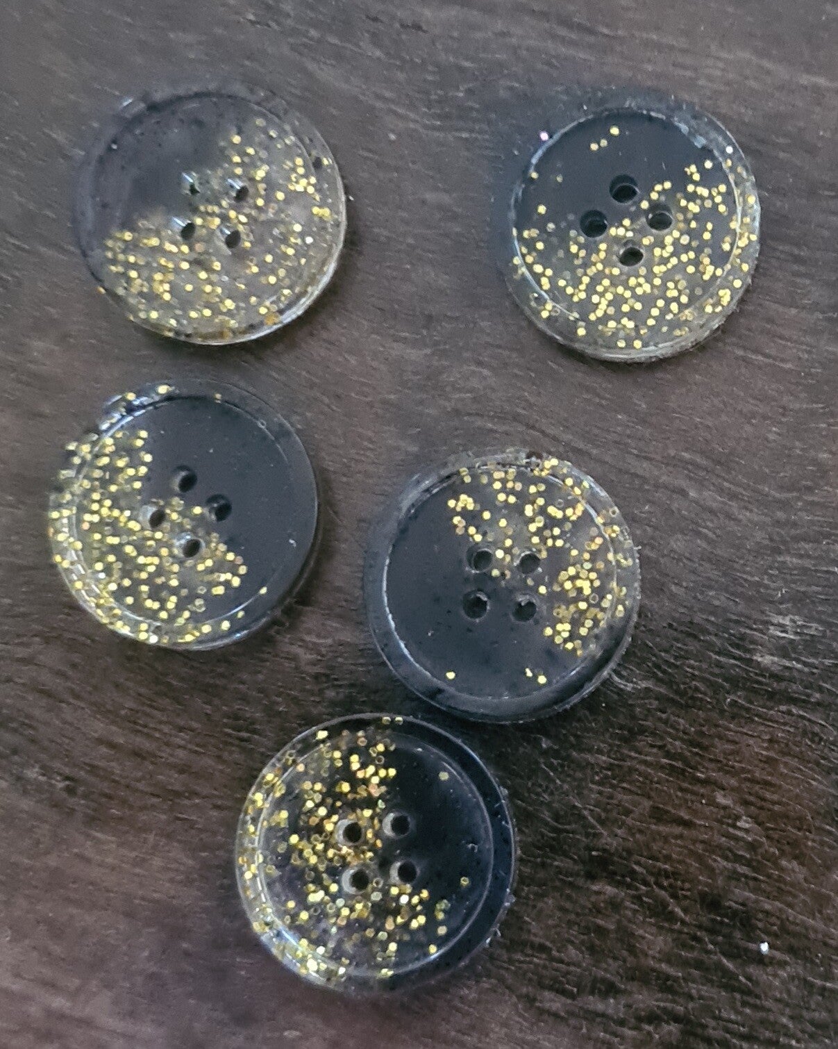 Knapp Svart + Guld glitter