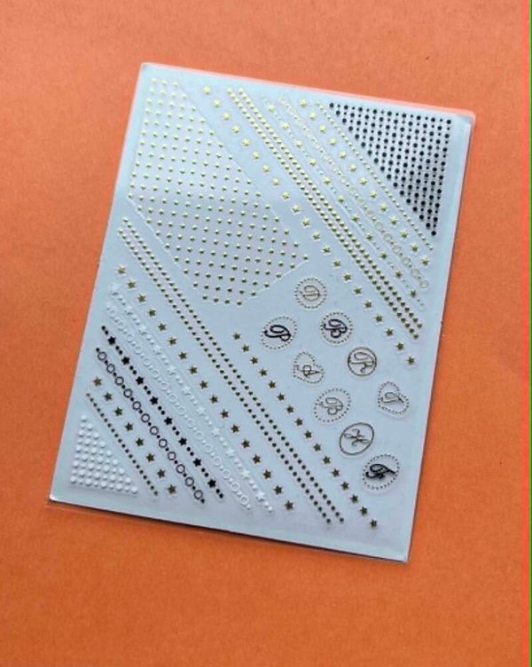 vel nagelstickers goud-zwart-wit (158) Laatste vel