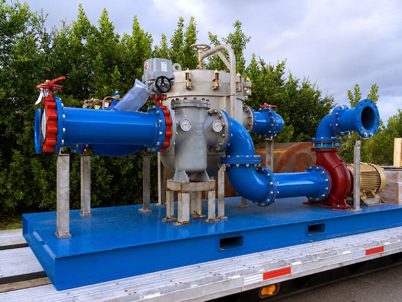 Filter backwash pumping and reclaim skid system in a municipal water treatment application