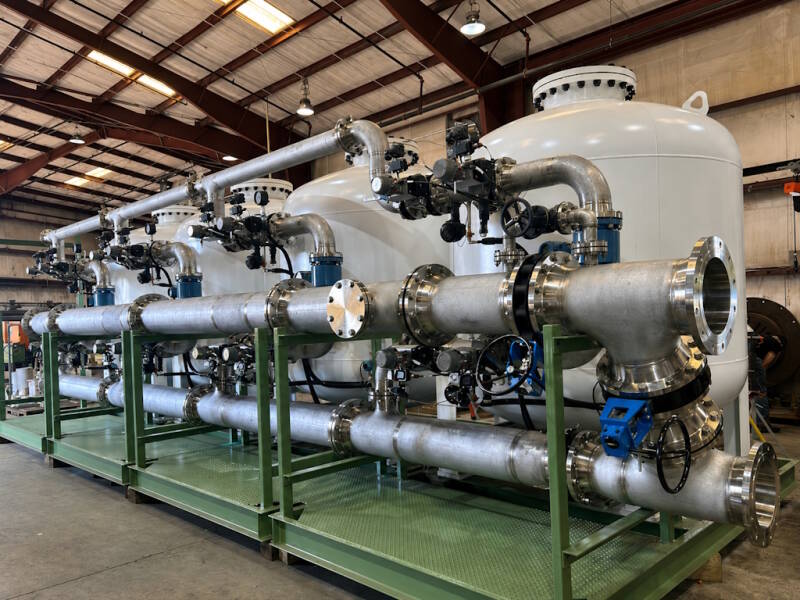 Sand filter system in an industrial cooling tower filtration application