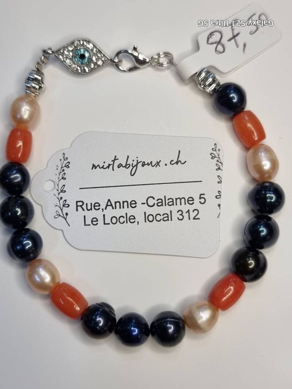 Bracelet en perles violet ,rosé, et corail