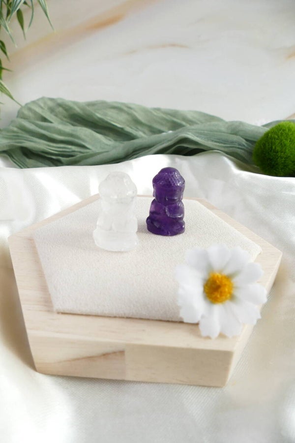 Buddha aus Bergkristall/Amethyst