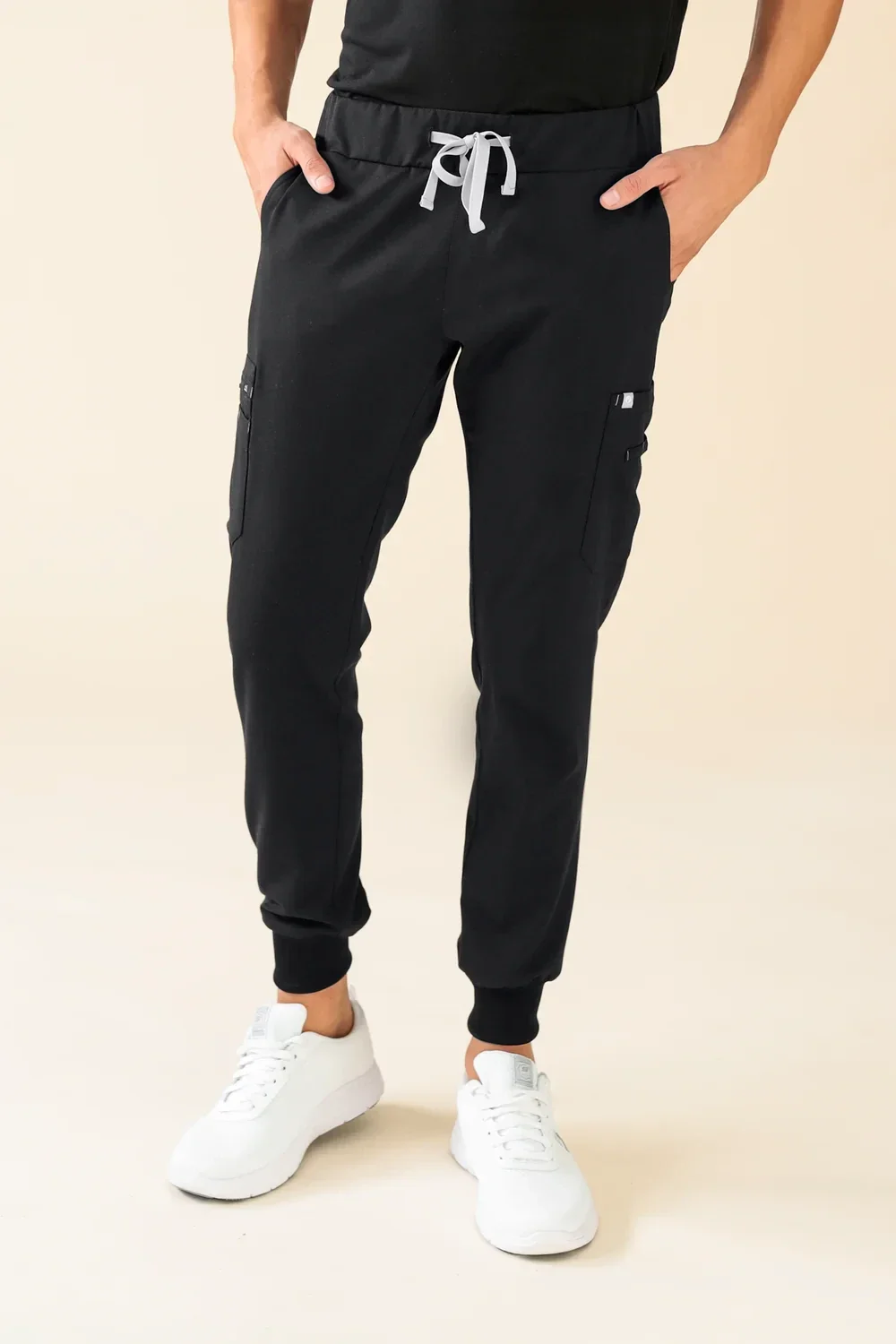 Uomo: KAERE Pantaloni - orlo elasticizzato con tasche sulle gambe