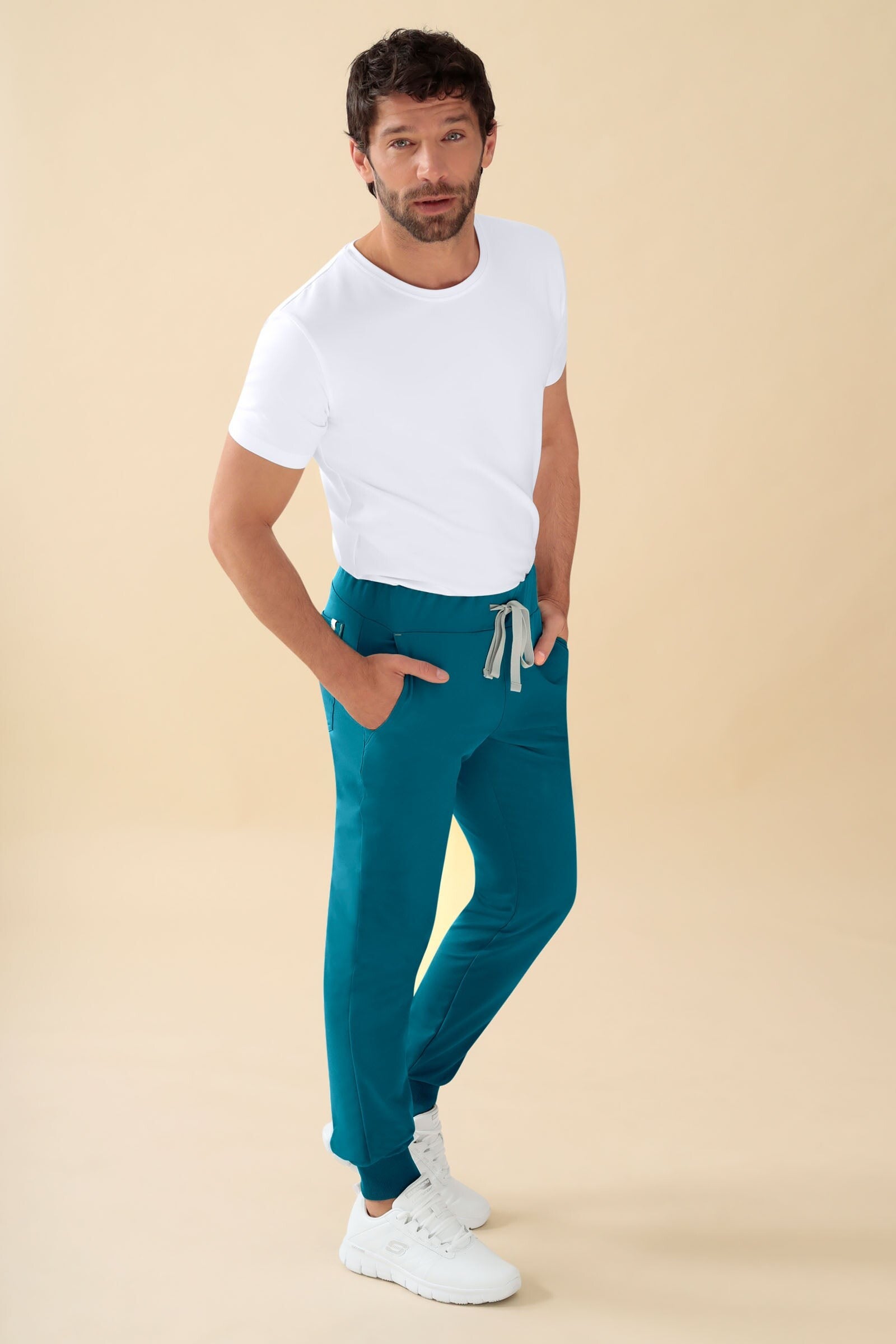 Uomo: KAERE Pantaloni - orlo elasticizzato - taglia corta - senza tasche sulle gambe