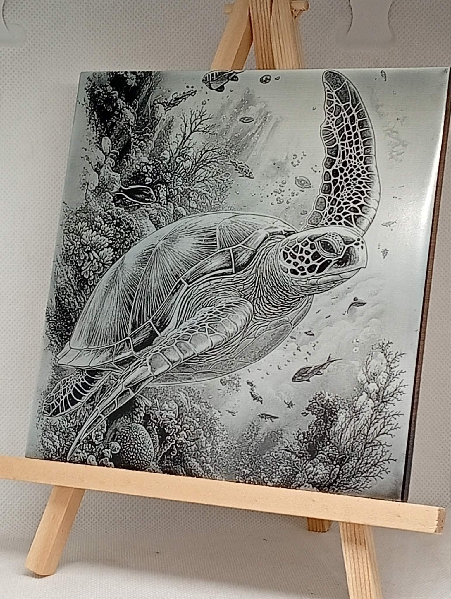 Carreau en céramique gravé – Évasion sous-marine