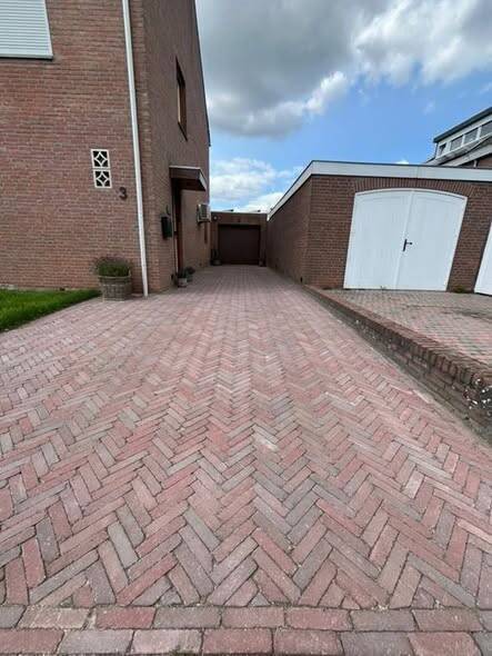 Oprit van waaltjes in visgraat