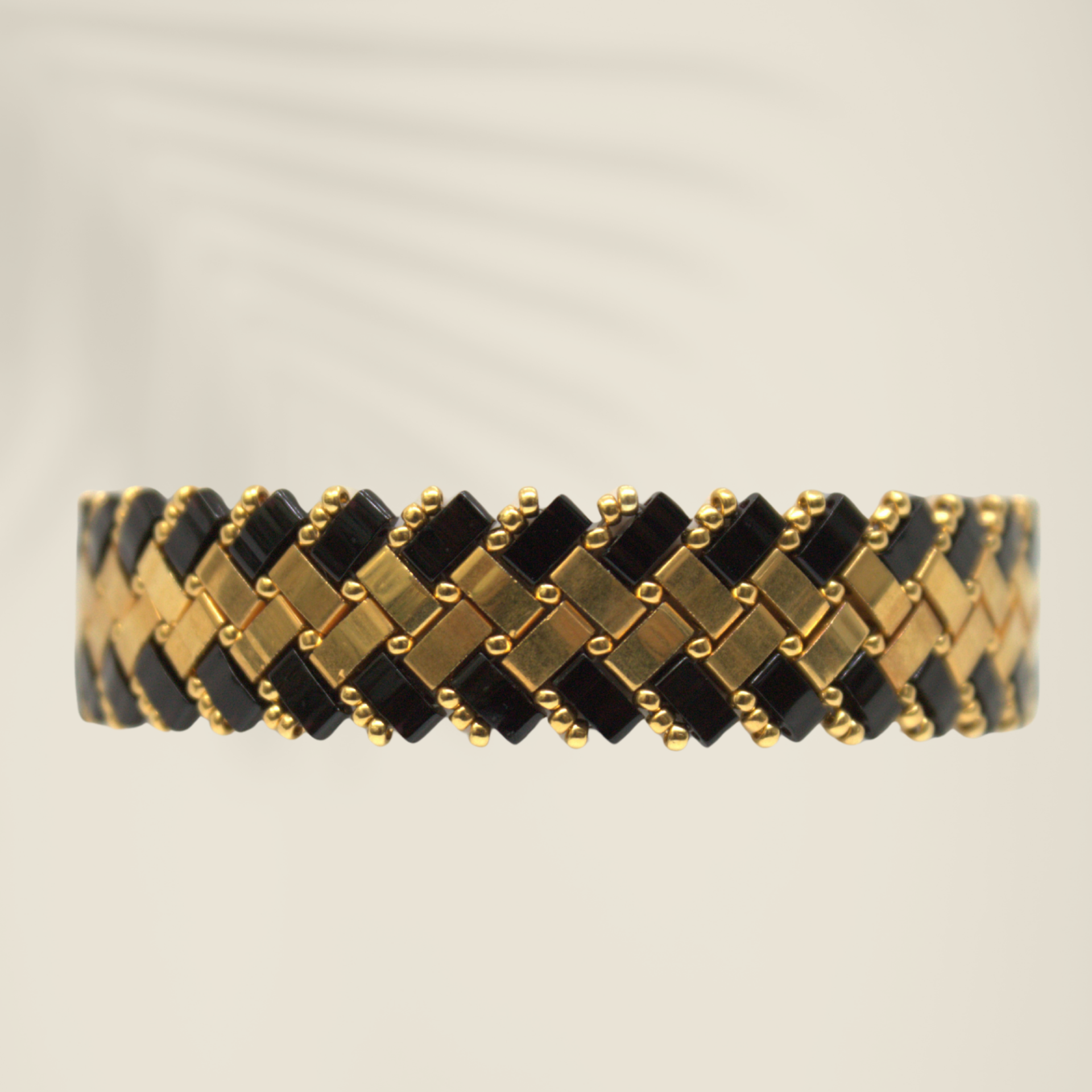Bracelet deux chevrons noir et or