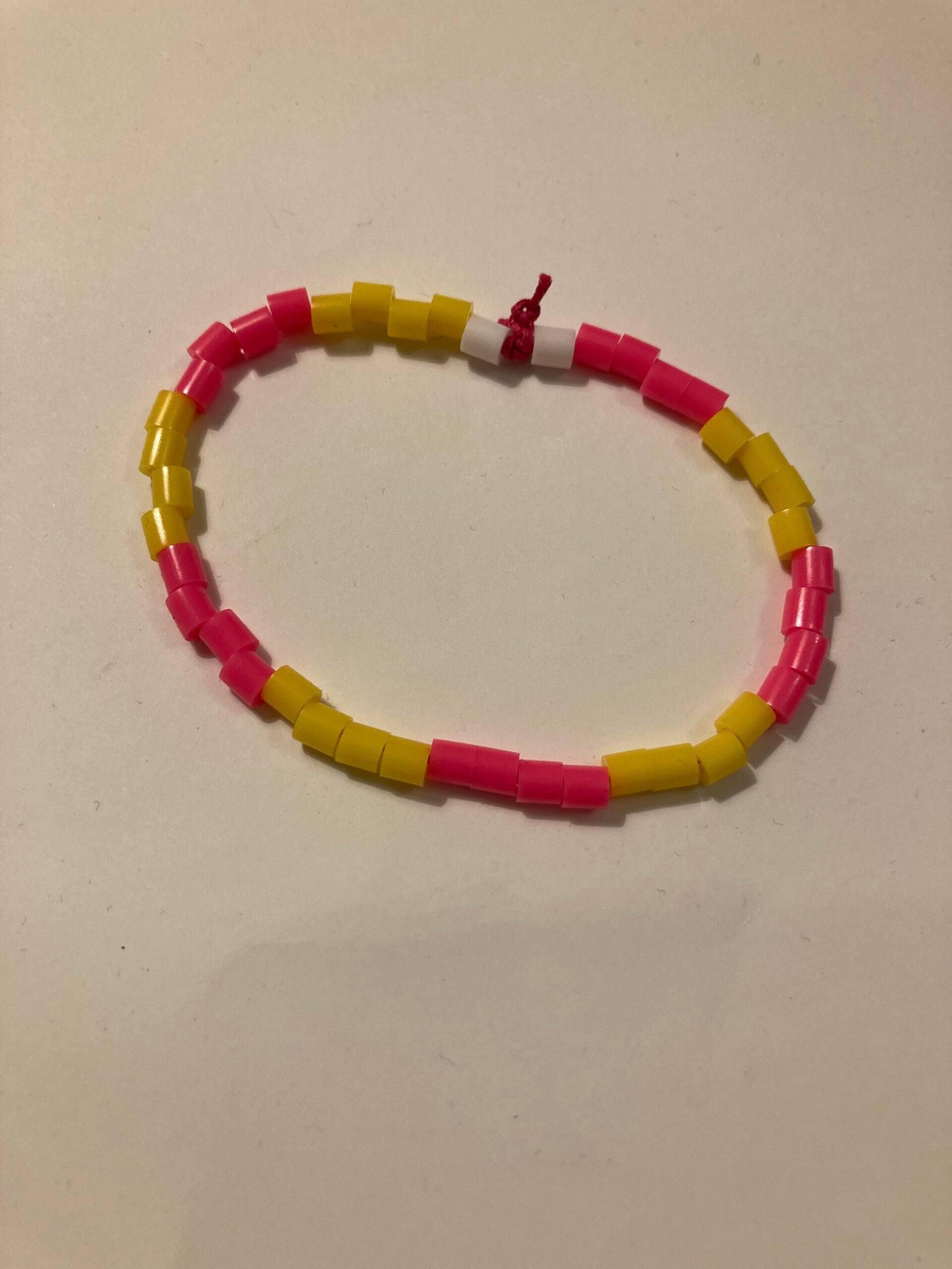 BRACELET Fluorescent Pink Bright Yellow And White Plastic Spacer Beads On Pink Cord