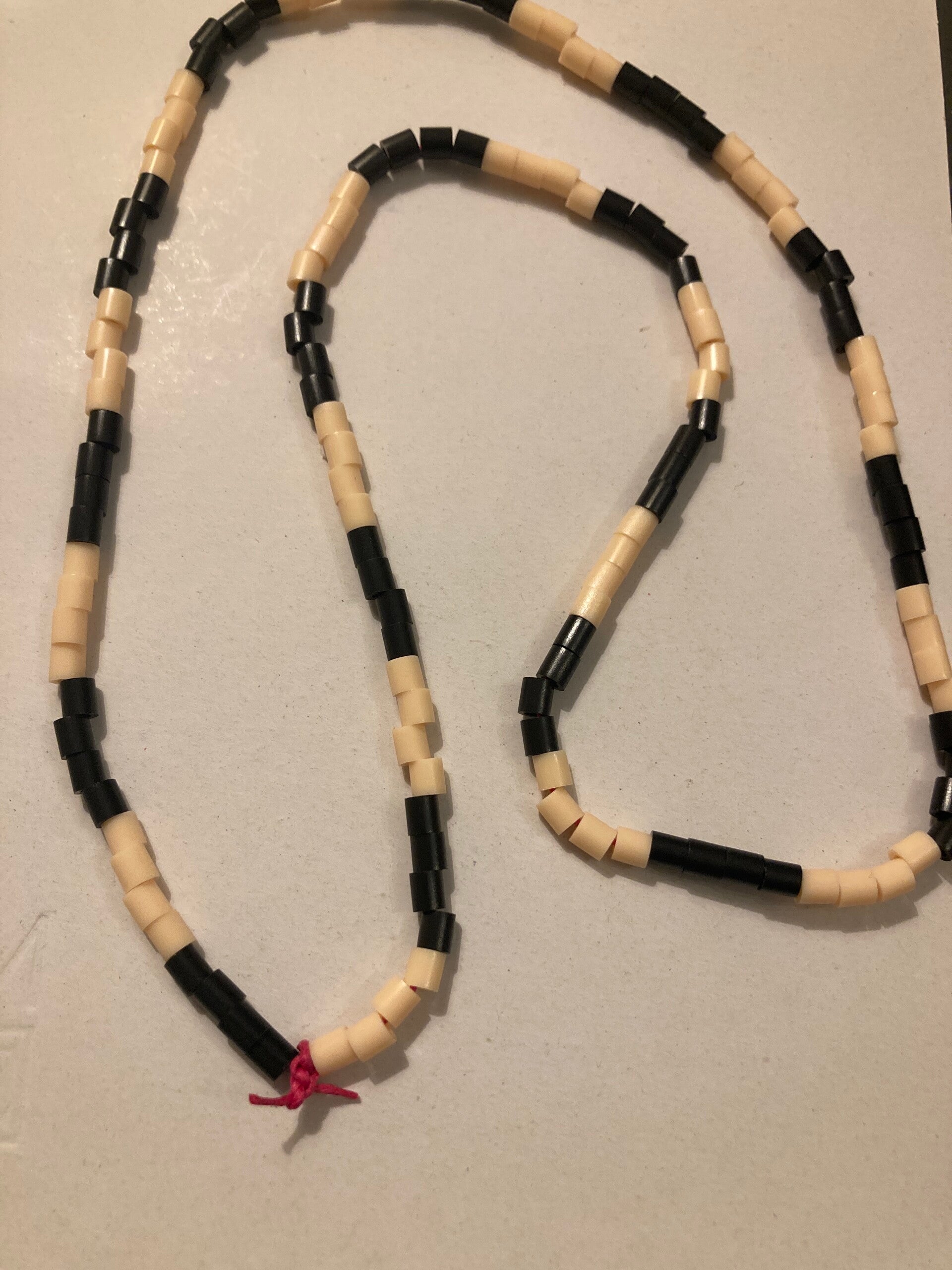 NECKLACE Apricot And Black Spacer Beads On Pink Cord