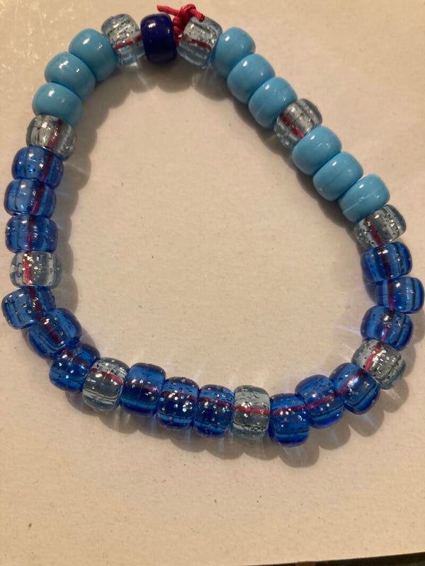BRACELET Peony Beads On Pink Cord Blue And Clear Speckled And Light Blue