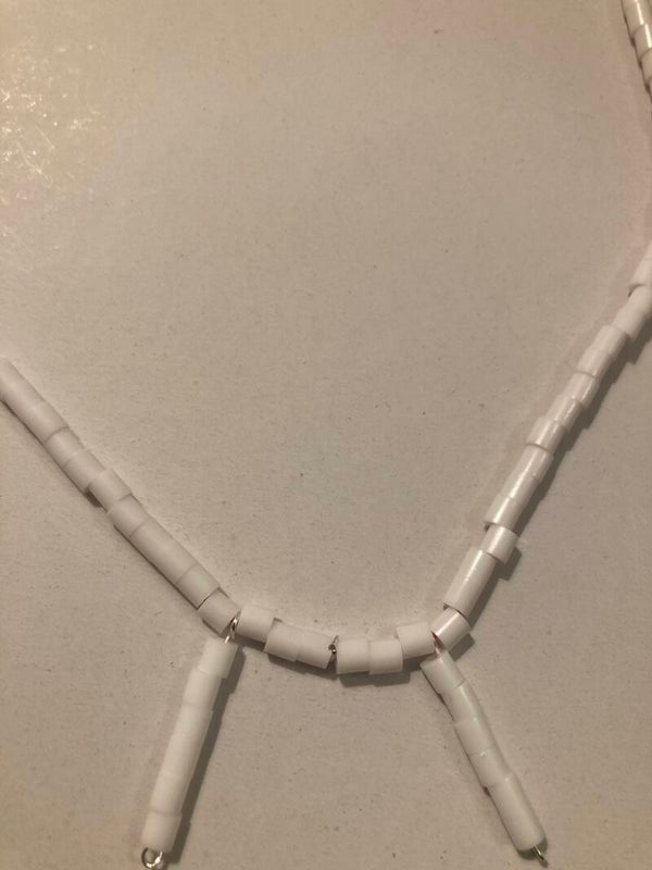 MATINEE NECKLACE White Plastic Spacer Beads And Silver Plated Fastenings On Pink Cord