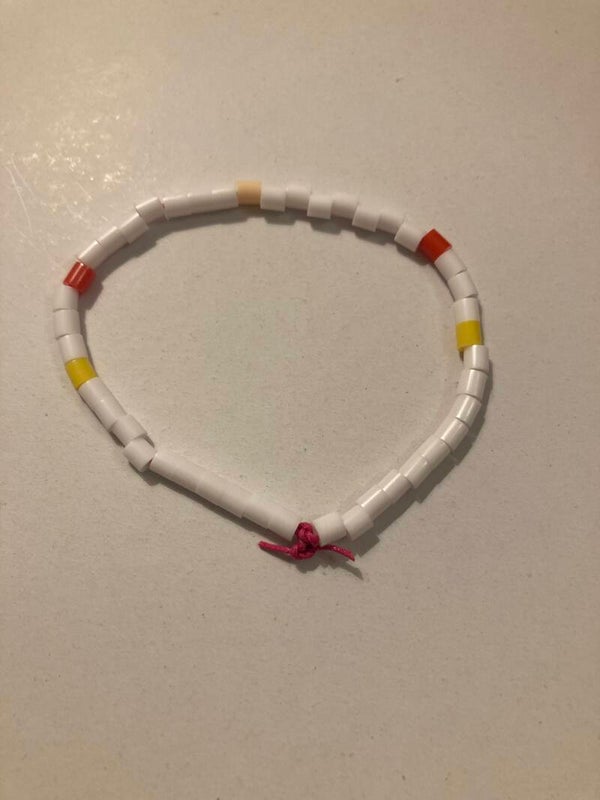 BRACELET Red Apricot Yellow White Spacer Beads On Pink Cord