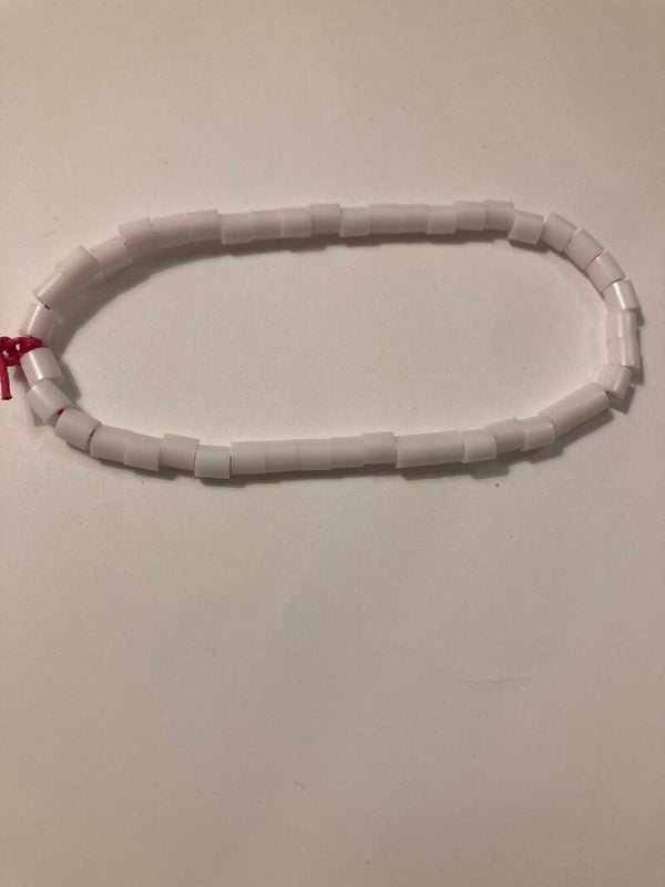 BRACELET White Plate Spacer Beads On Pink Cord