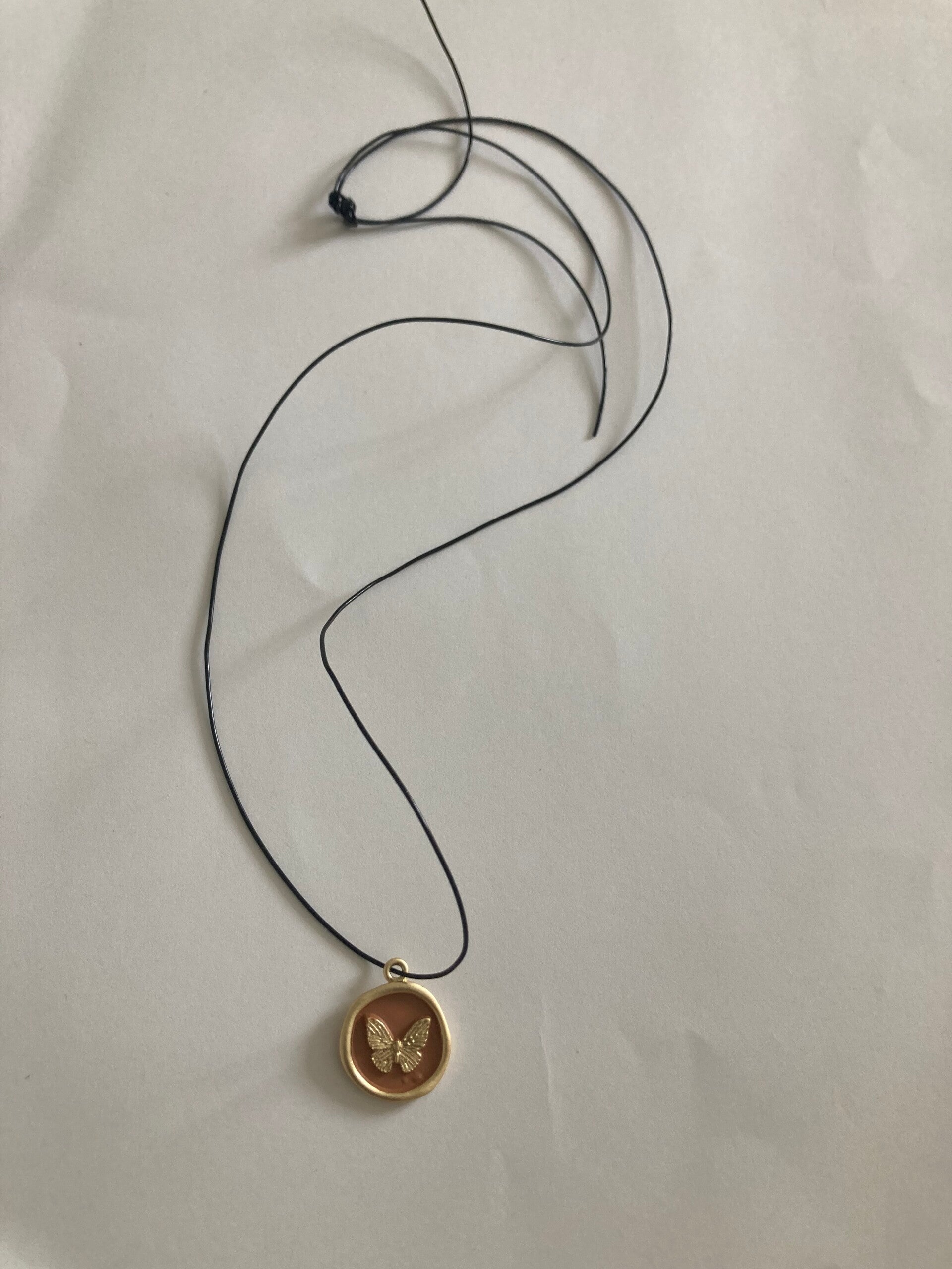 MATINEE NECKLACE Gold Plated And Rust Butterfly Pendant Black Slightly Elastic Cord