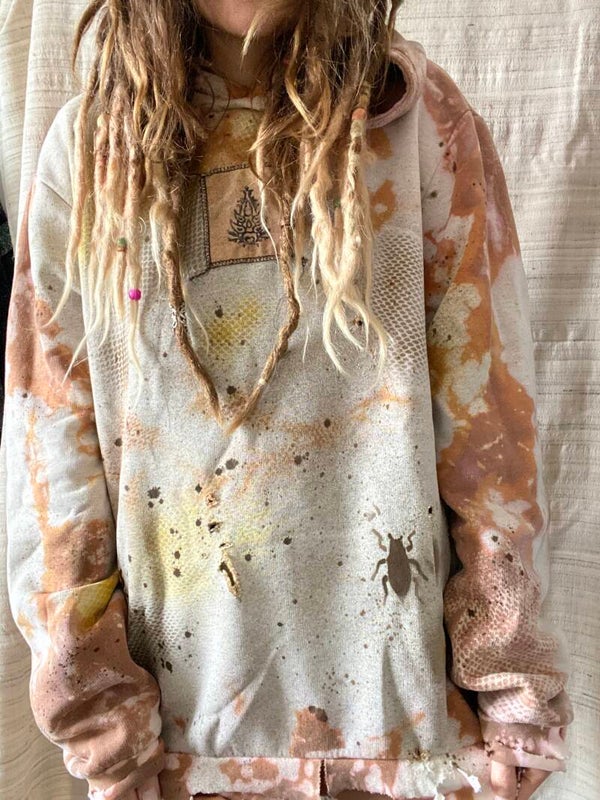 muddy hoodie with destroyed mud sleeves