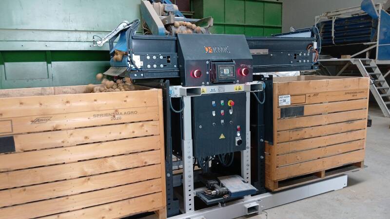 Kistenvuller met weeginrichting