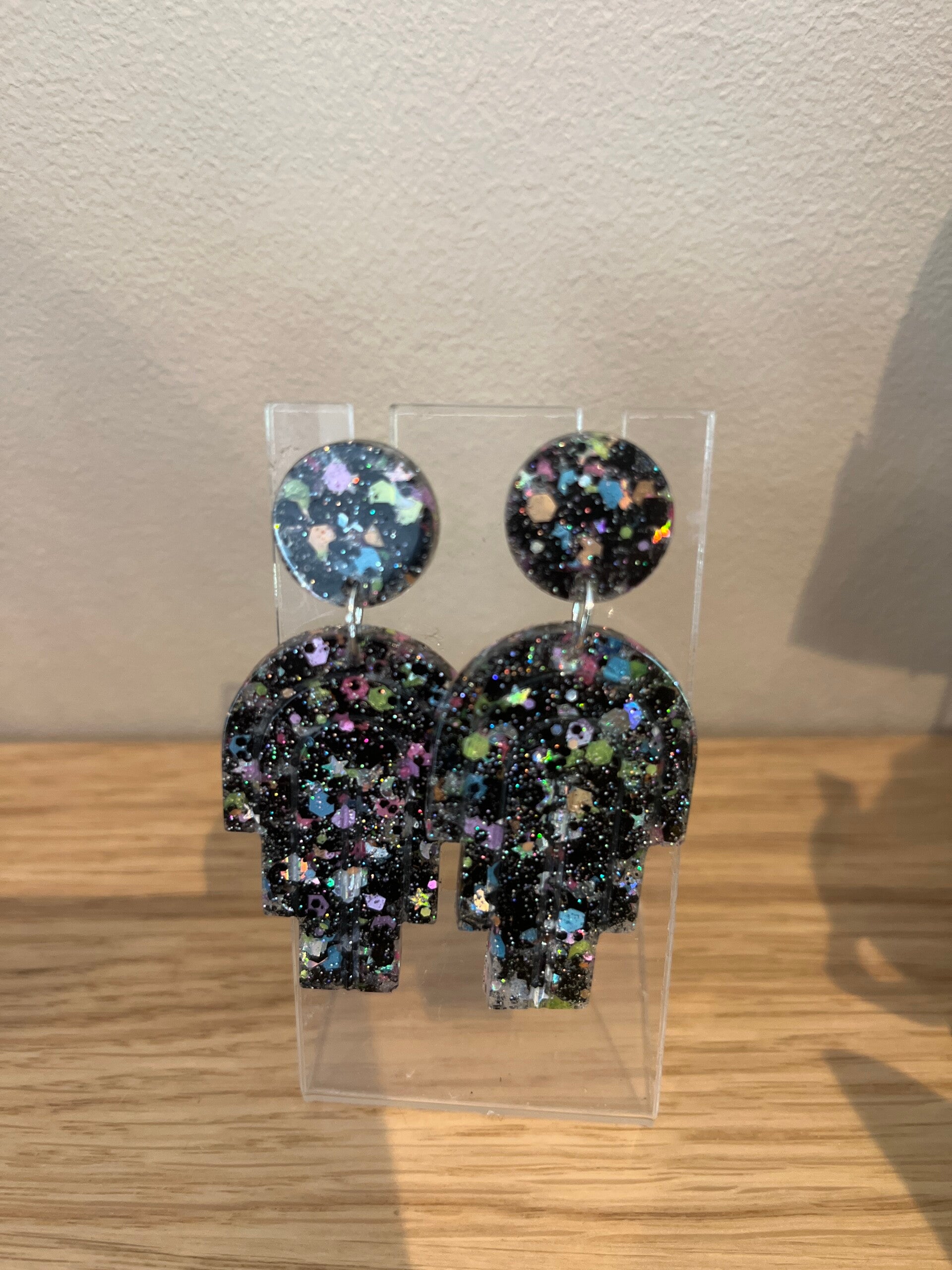 Les boucles d'oreilles Mercredi