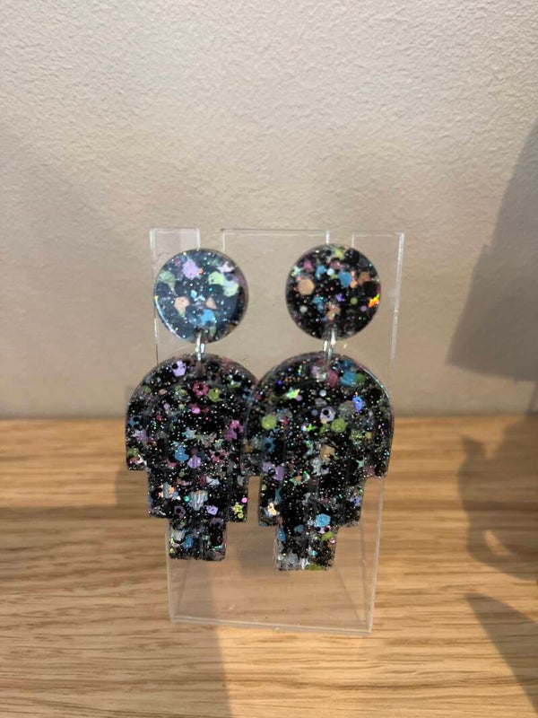 Les boucles d'oreilles Mercredi