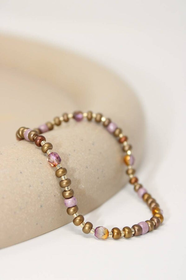 Armband goud/licht paars
